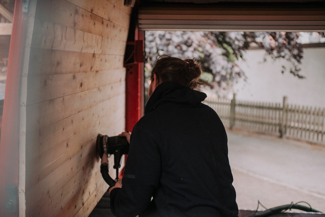 The Art of Drawing Readers In: Your attractive post title goes here woman-in-black-hoodie-holding-black-dslr-camera-8uzjsjikqsw